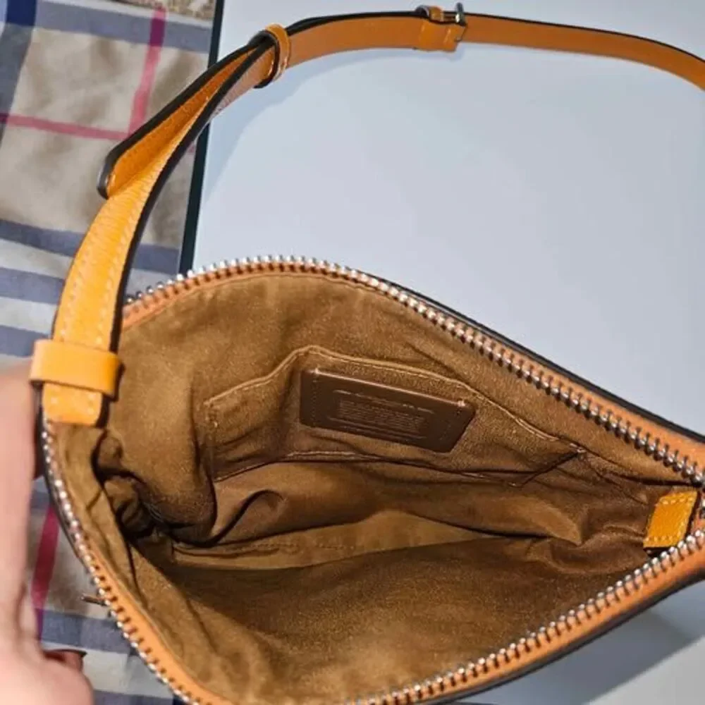 Coach Papaya Solid Crossbody Bag Zip Closure Adjustable Strap Inner Pockets